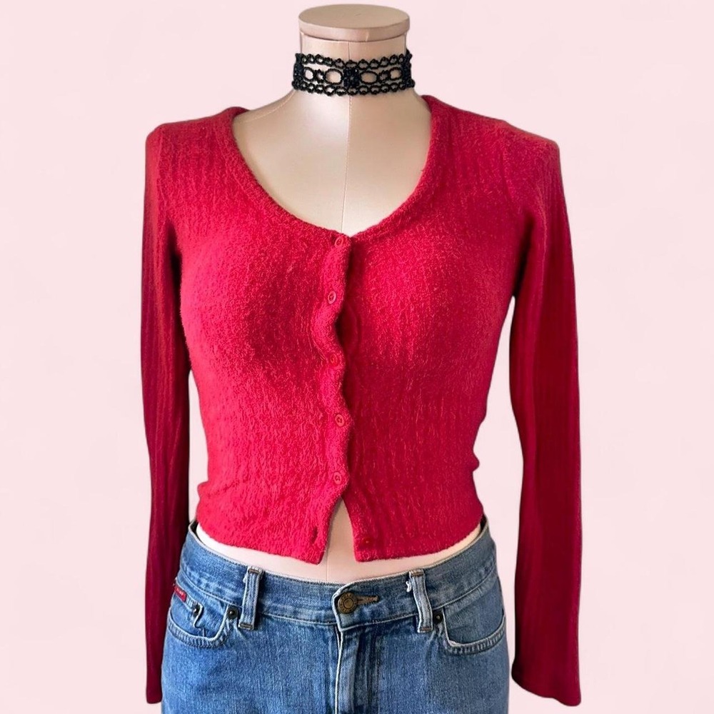 oft stretchy ribbed‎ knit long sleeve with a flattering deep V-neck